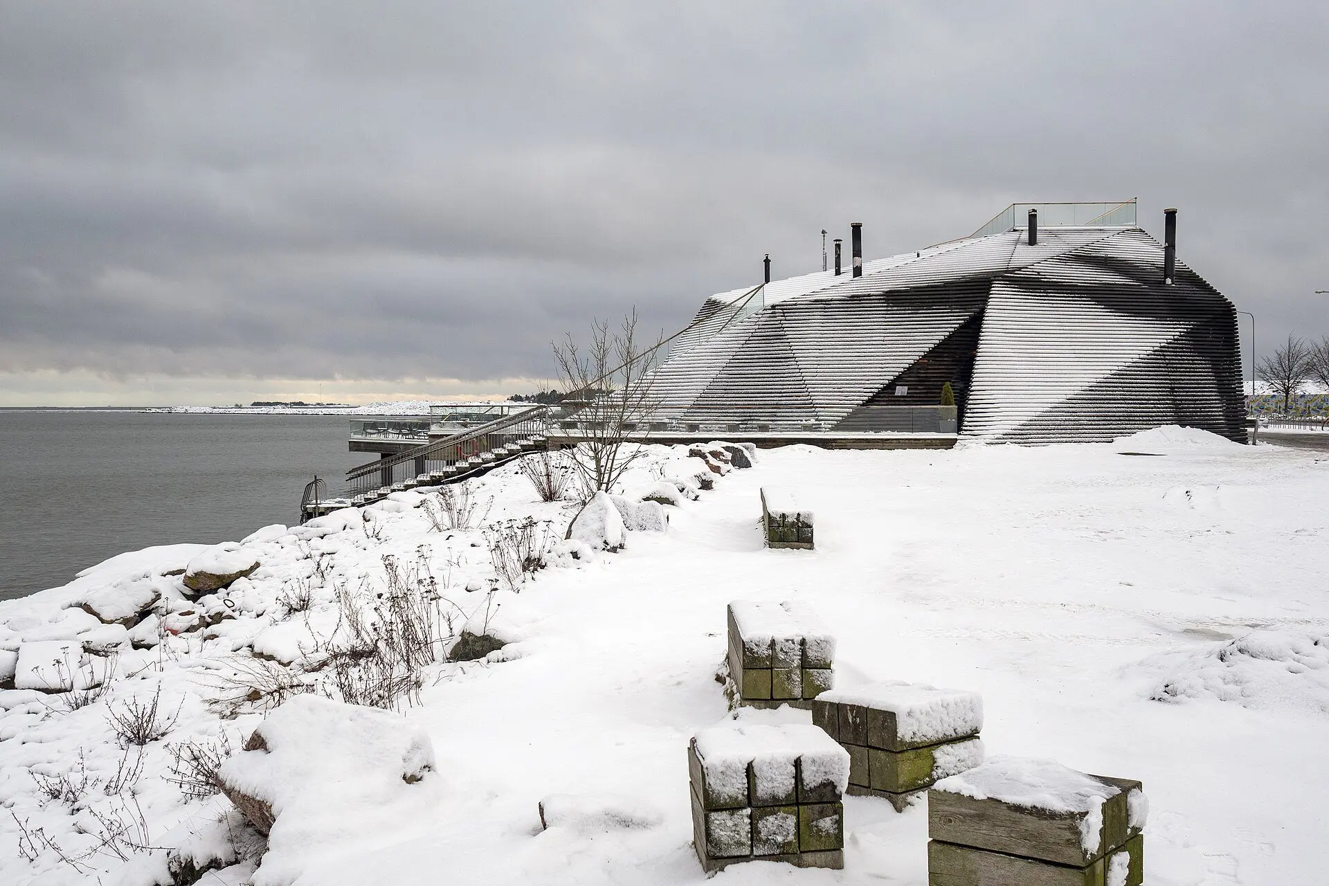 Löyly, the modern public sauna on the Helsinki seafront, under snow