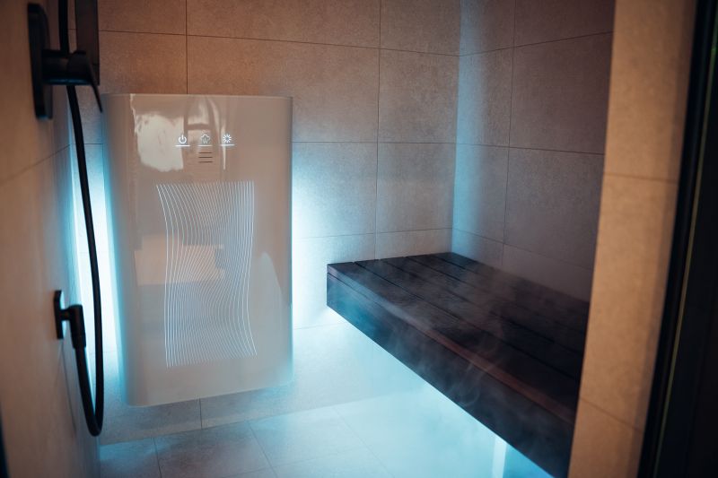 Aur tumeda pingi kohal Auroomi Outdoor Spa näitusemudeli plaaditud auru- ja duširuumis