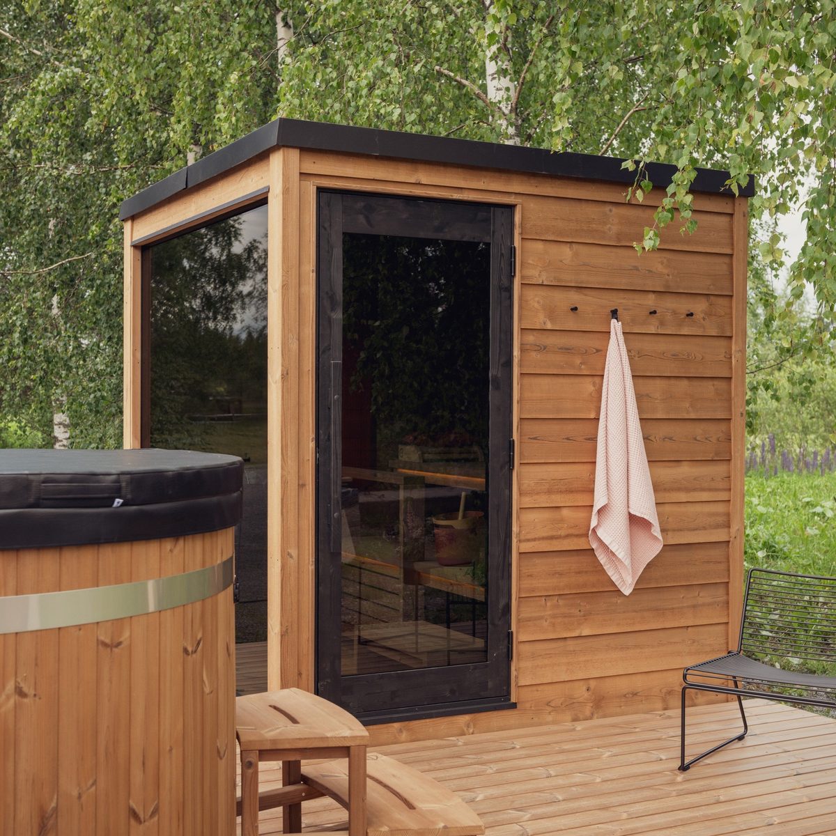 ThermaSol Nordic Dawn outdoor sauna with heat-treated Finnish pine exterior and metal roof, Kirami FinVision M Dawn in Europe, 2026