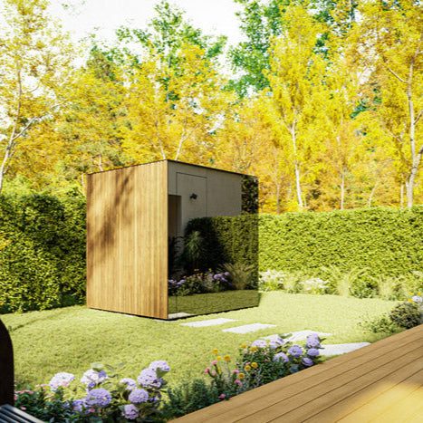 ThermaSol Spectra outdoor sauna with Parsol Dark Grey glass front and Tyrol wood facade, manufactured by Kirami in Finland, 2026