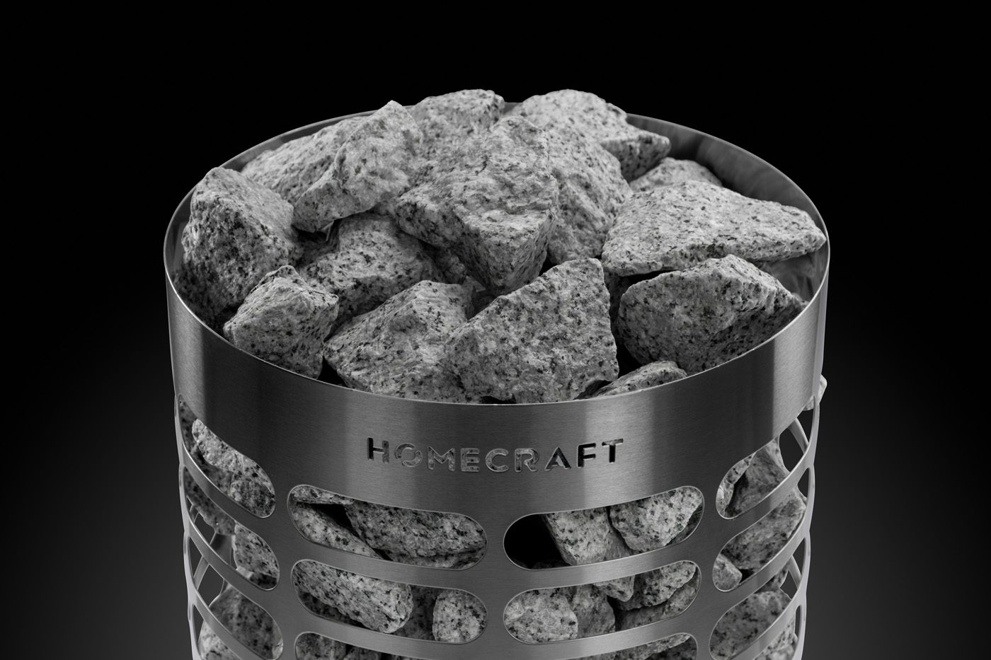 Sauna stones piled in the stainless steel basket at the top of a Homecraft Apex Mini heater