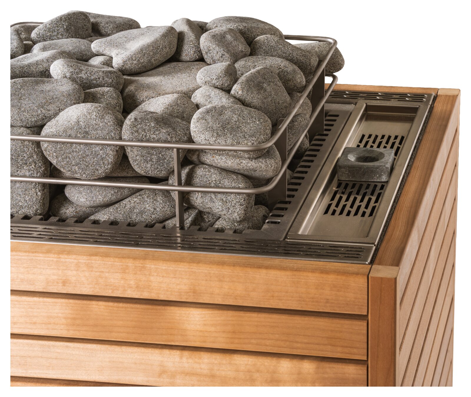 A HUUM CORE Pro Combi with slatted wooden side panels, stones on top and a separate perforated steamer compartment at one corner