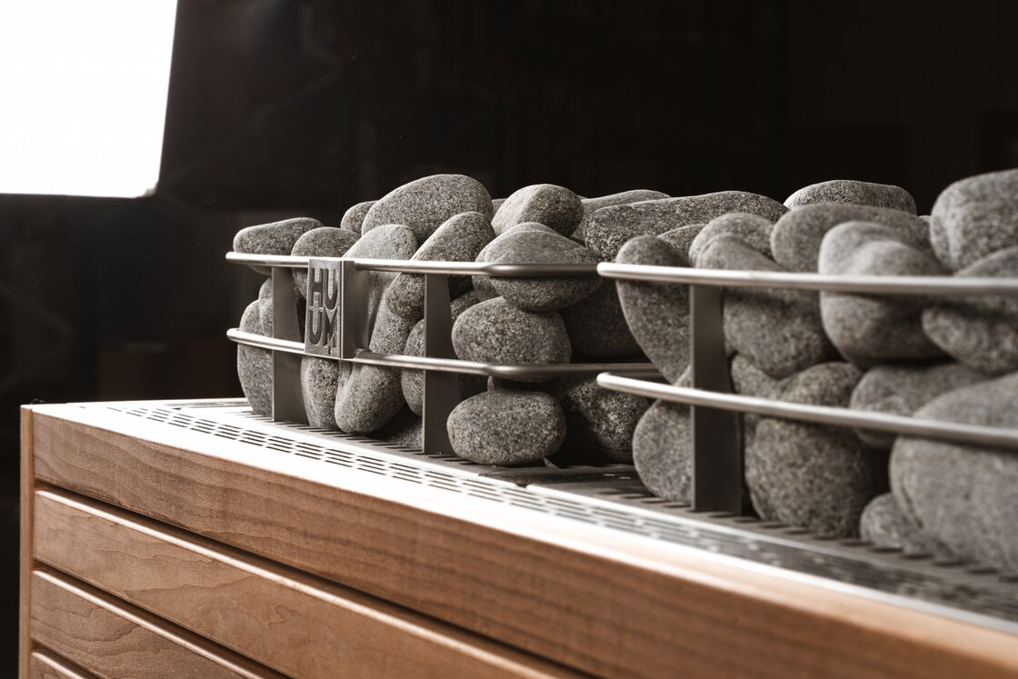 Two HUUM CORE Pro heaters side by side with an additional stone cage